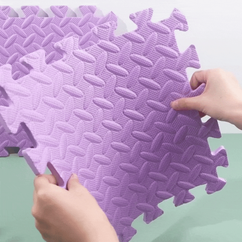 demonstrating how durable and elastic this foam floor tile is
