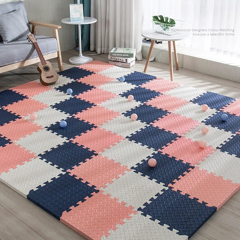 Pink, white, and navy blue baby foam floor tiles