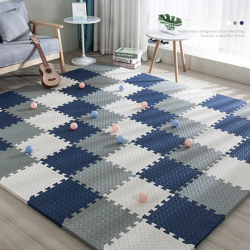 Gray, white, and navy-blue baby foam floor tiles