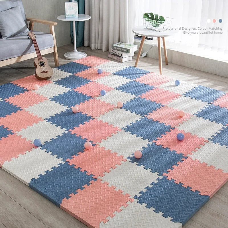 navy blue, white, and pink baby foam floor tiles
