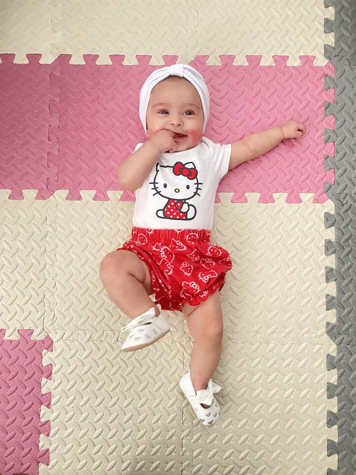 baby on interlocking foam mat